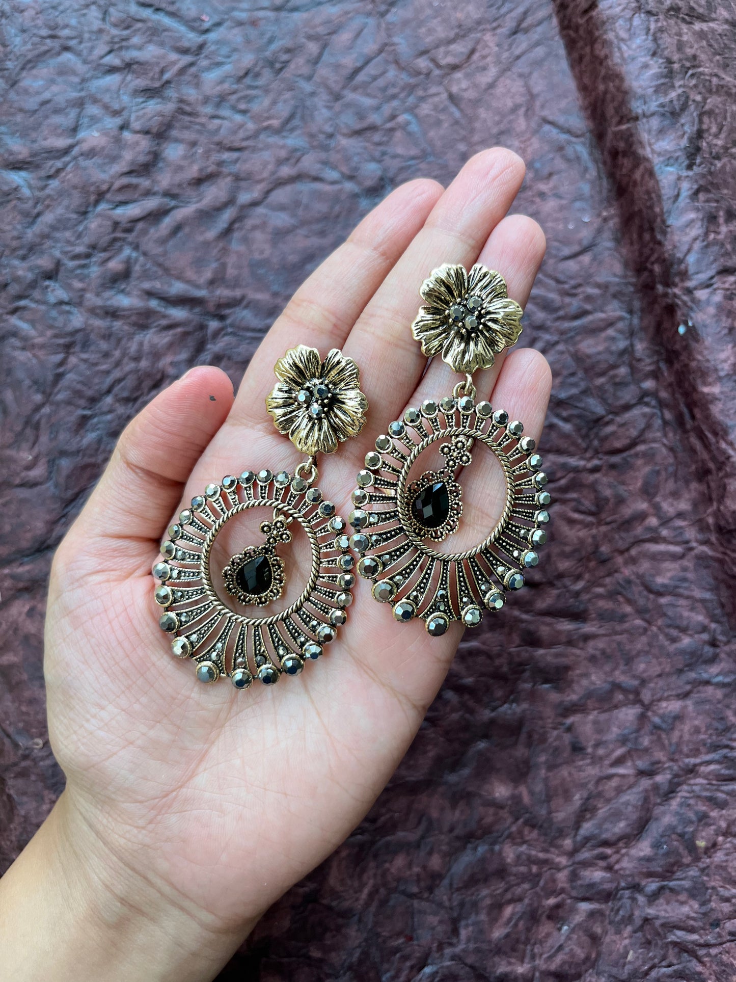 Dual tone statement earrings